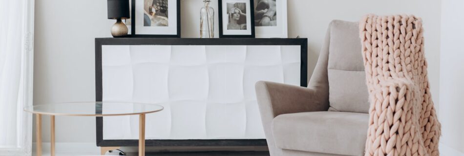 beige sofa chair near a table